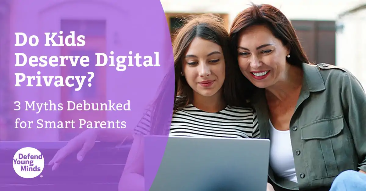 Mom and daughter looking at a laptop together smiling