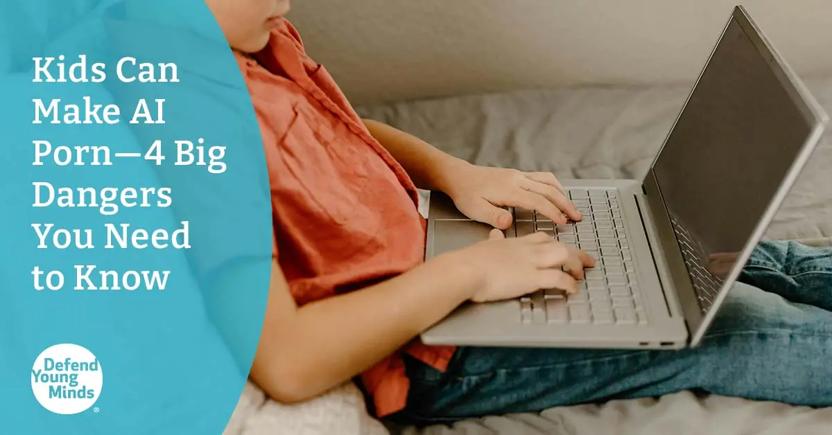 Image of a child typing on a laptop.