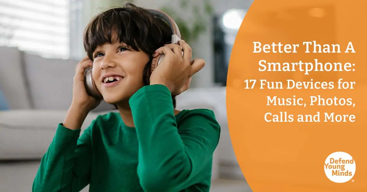 A kid wearing headphones enjoying music.