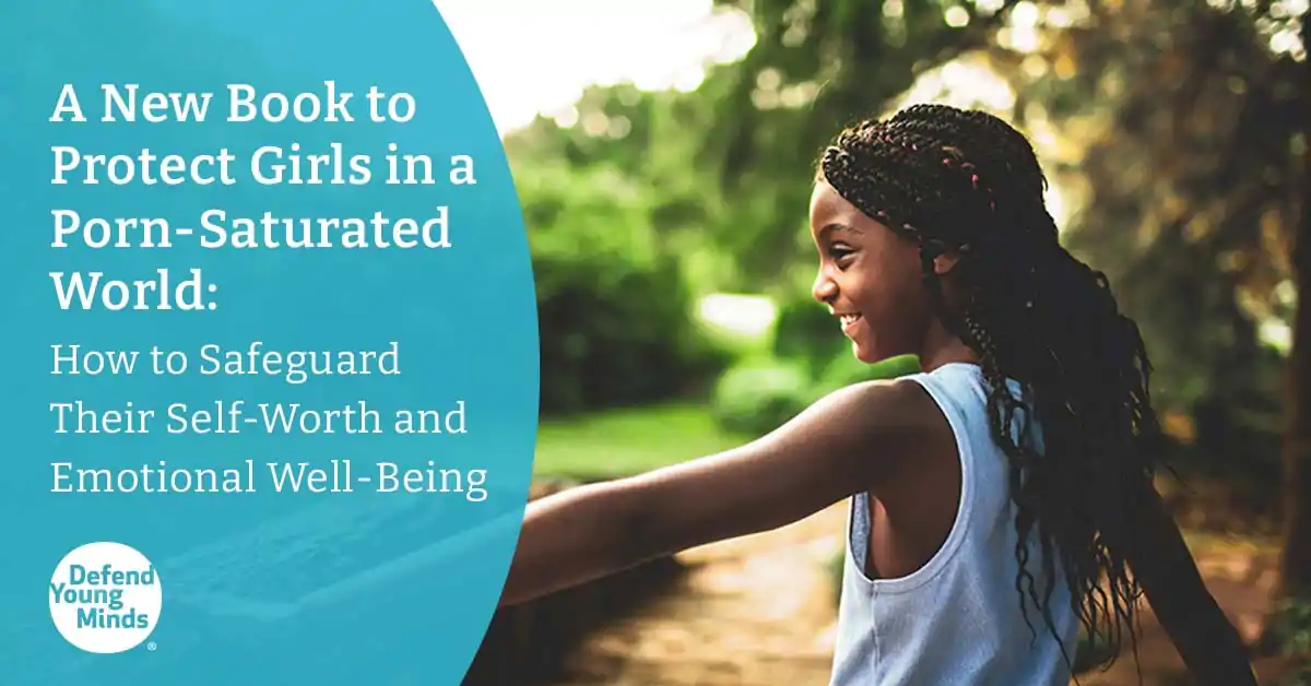 A young, happy girl smiling while spending time outdoors.