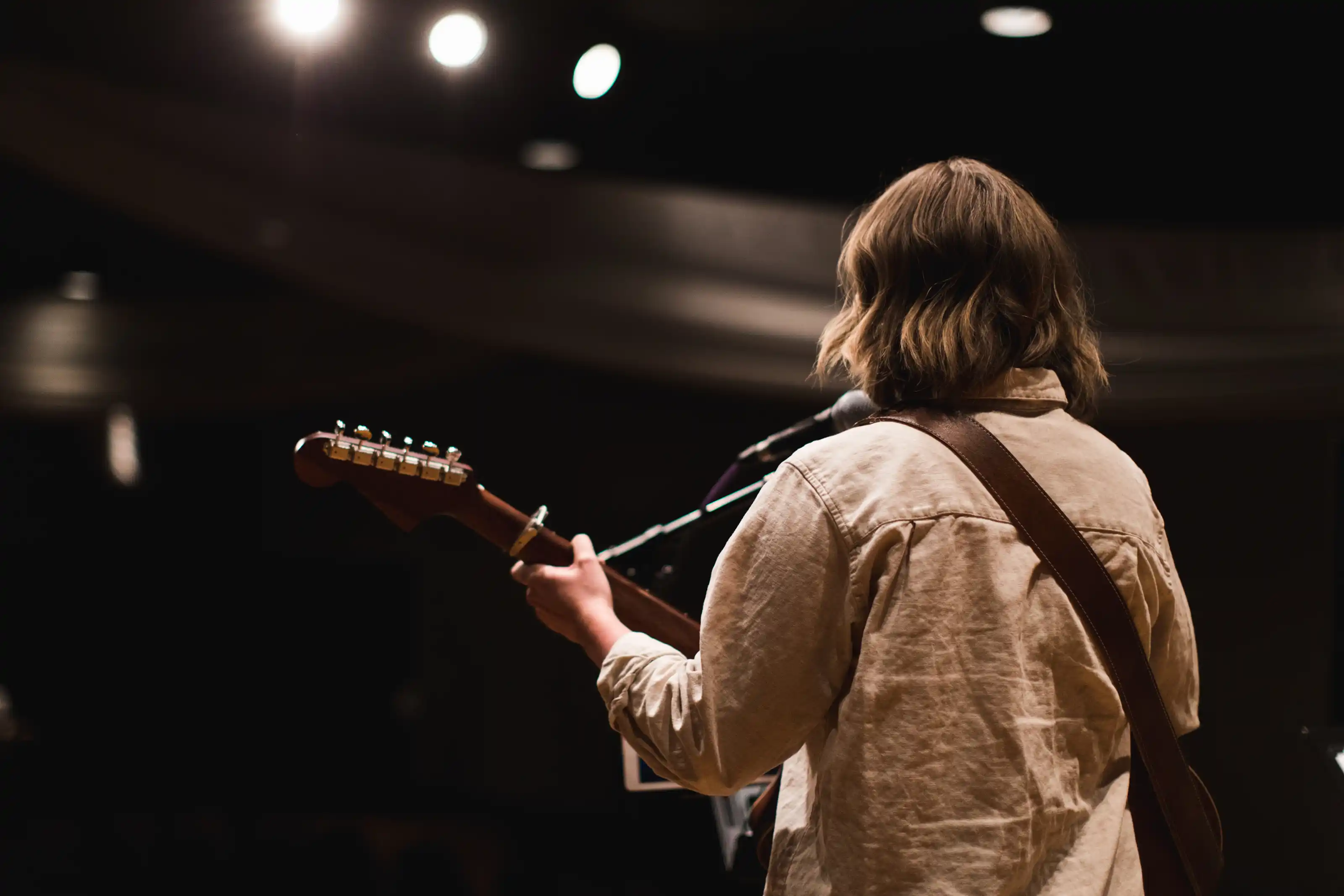 Small group of different people spanning generations happily walking through Minneapolis.