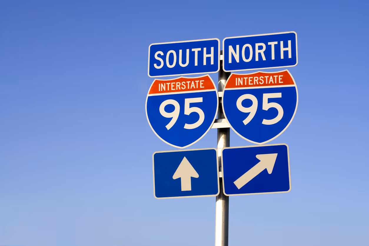 Stock photo of interstate 95 road sign against blue sky