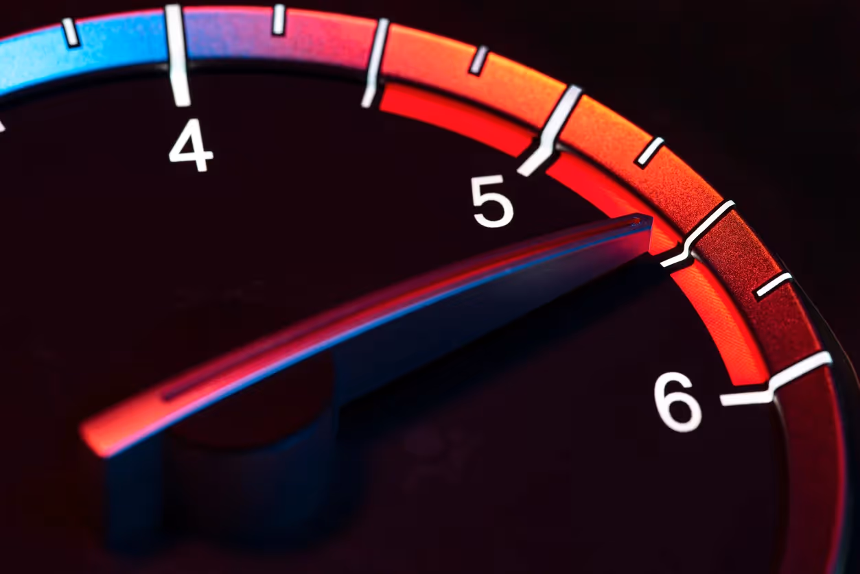 A car's tachometer redlining