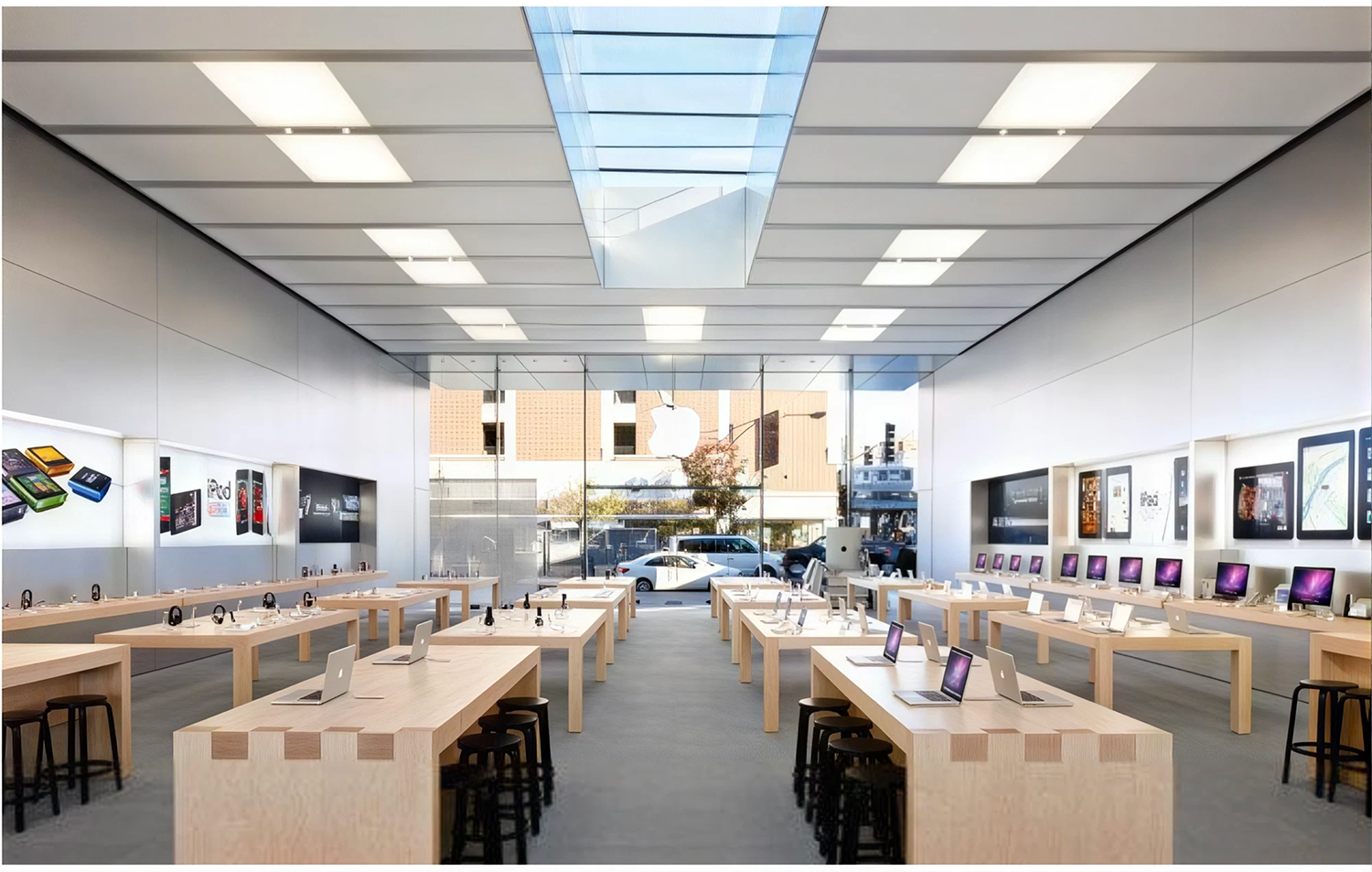 Apple Store with organized product tables and displays