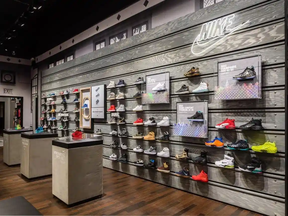 Nike wall display featuring colorful athletic shoes