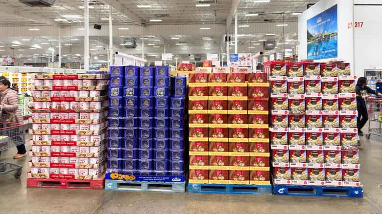Costco products stacked in large pallet displays