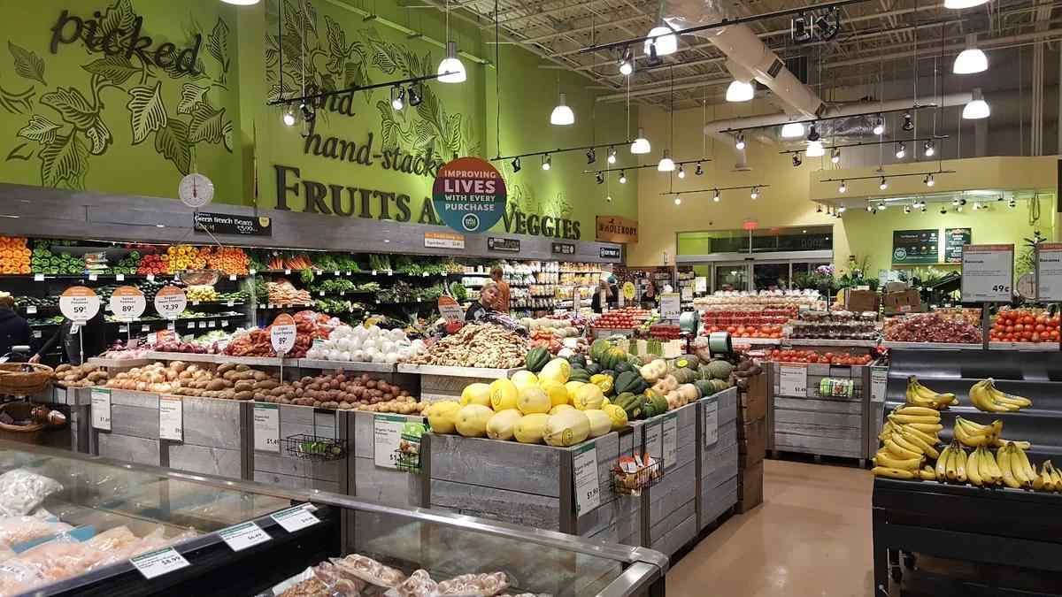 Whole Foods produce display with colorful fresh produce