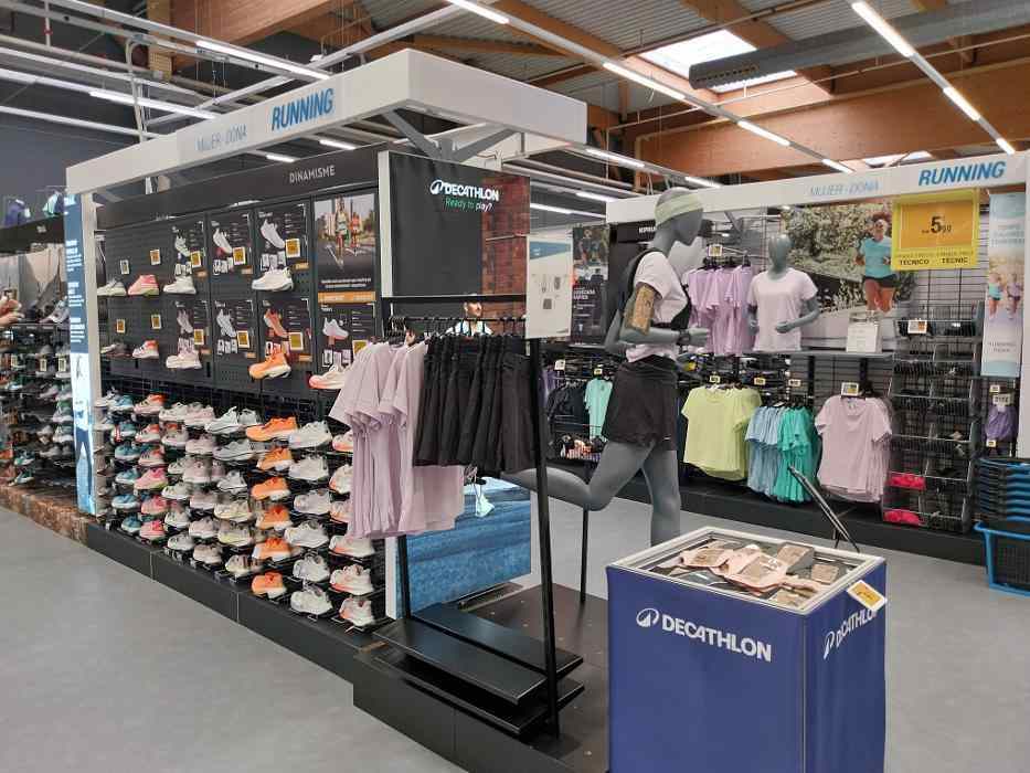 Decathlon running section with apparel and footwear