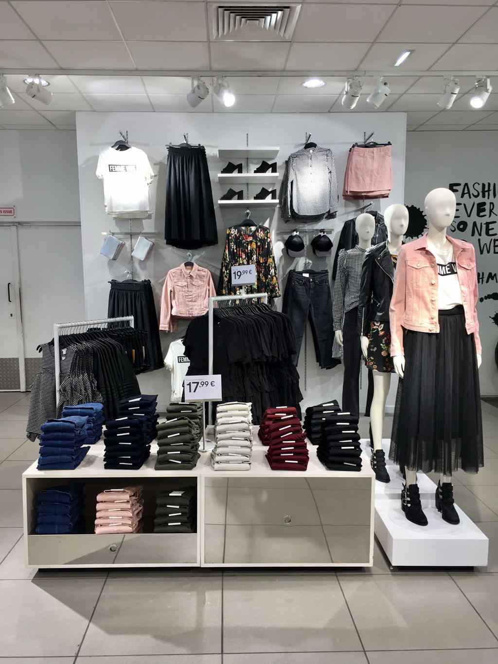 H&M store with mannequins and clothing displays