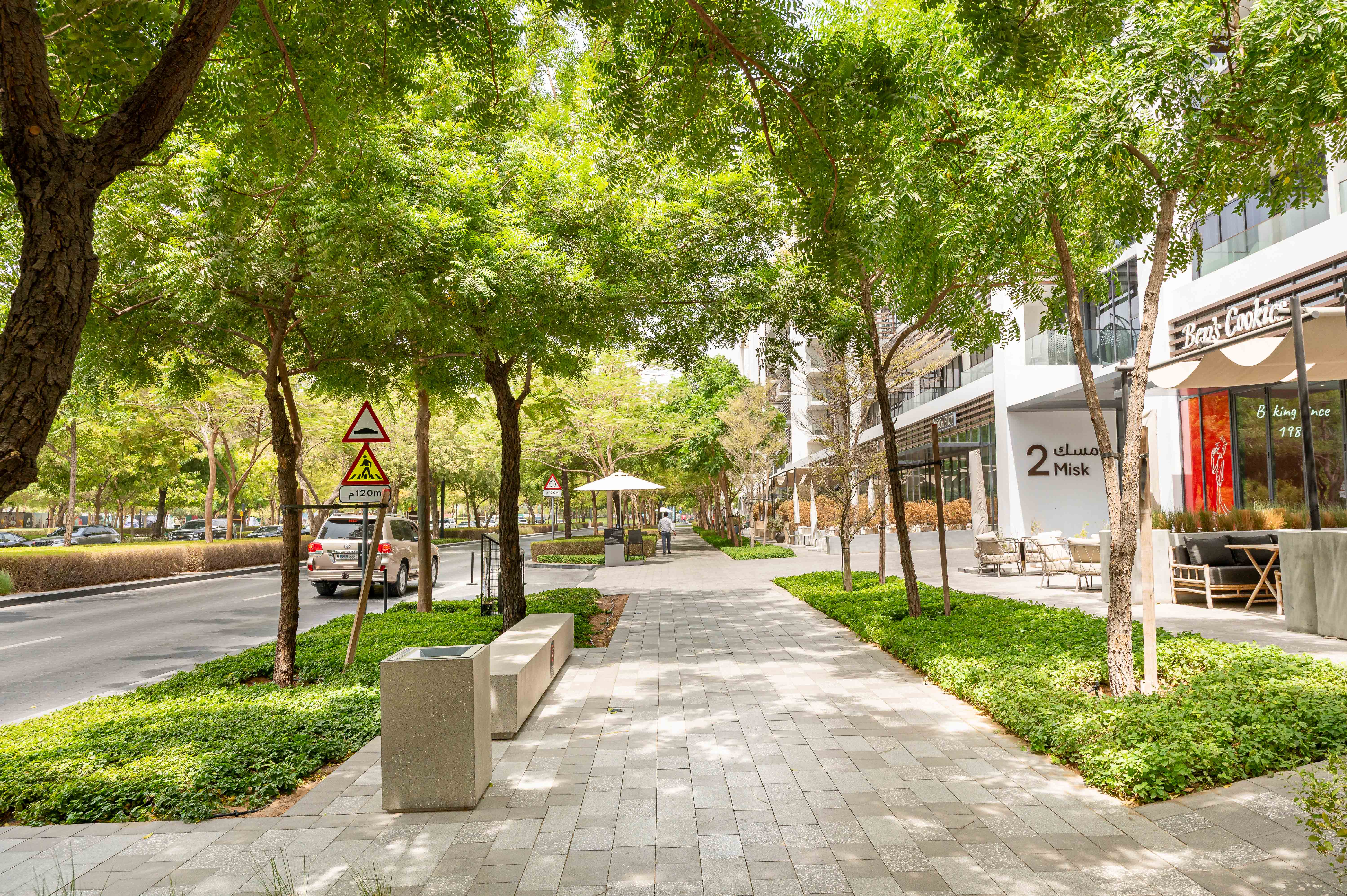 The dense planting design and sophisticated hardscape design of the first phase of the Aljada development sets the scene for the site wide landscape aesthetic of future phases.