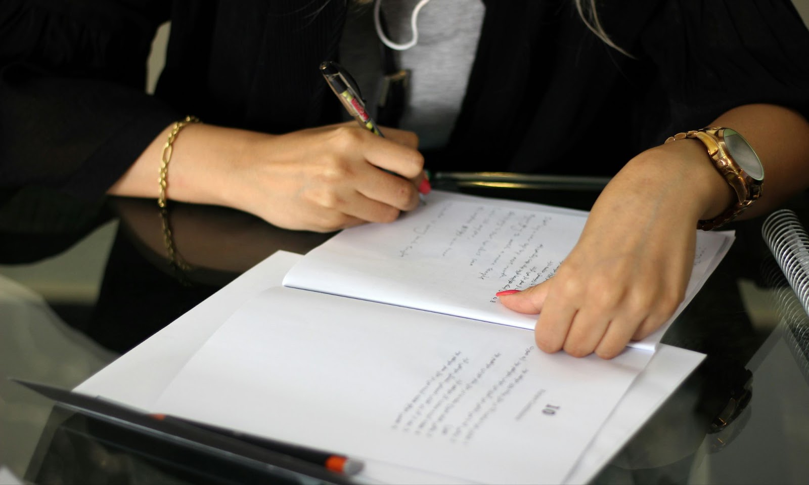 Handshake over a signed contract at a business meeting