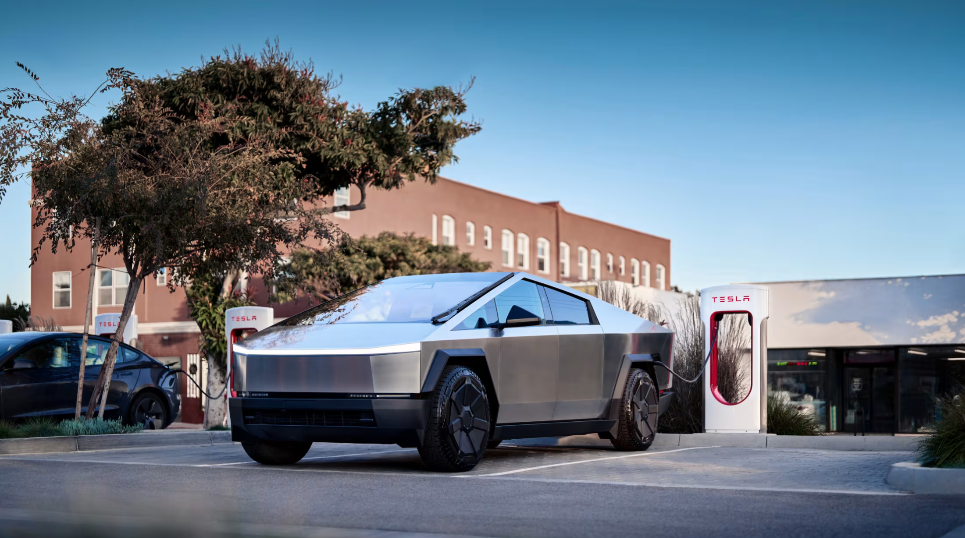 “Tesla Cybertruck charging at a Supercharger, demonstrating EV thermal management for high-performance efficiency (https://ev.iphonemod.net)