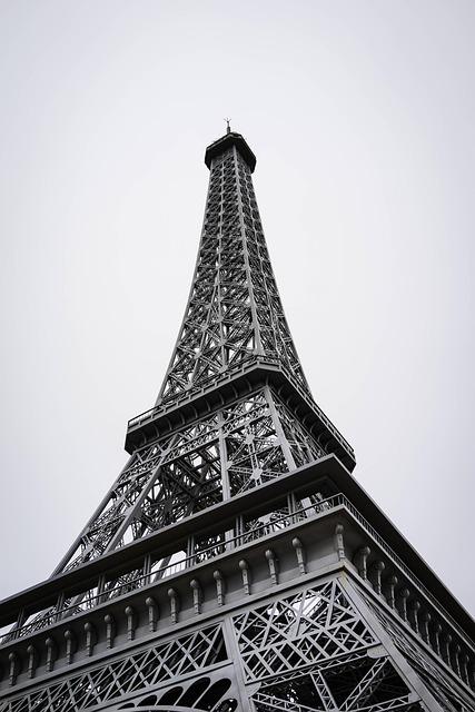 Eiffel Tower illustrating visible structural elements: lattice trusses, inclined legs, girders, and bracing systems