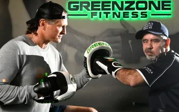 Mark Esler, former resident of brightwater oats street, trains with boxer danny green in the lead up to his world record attempt of longest distance travelled with one arm in a wheelchair