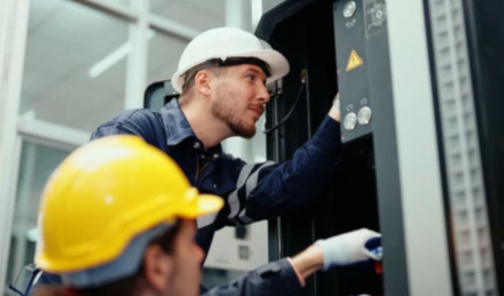 image of two technicians carrying out a maintenance work order