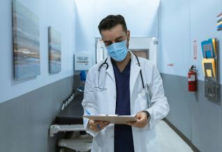 image of a healthcare worker examining a checklist
