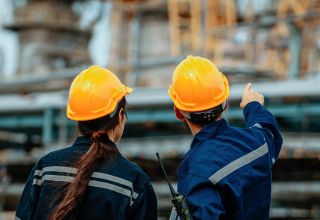 image of two facility safety workers on a site inspection
