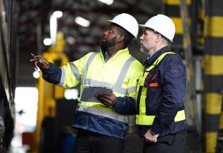 image of two facility management staff conducting an asset inspection