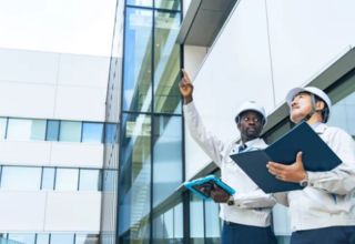 image of two facility management staff conducting an inspection