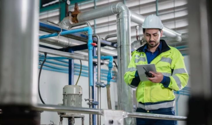 image of a facility site contractor checking a site asset