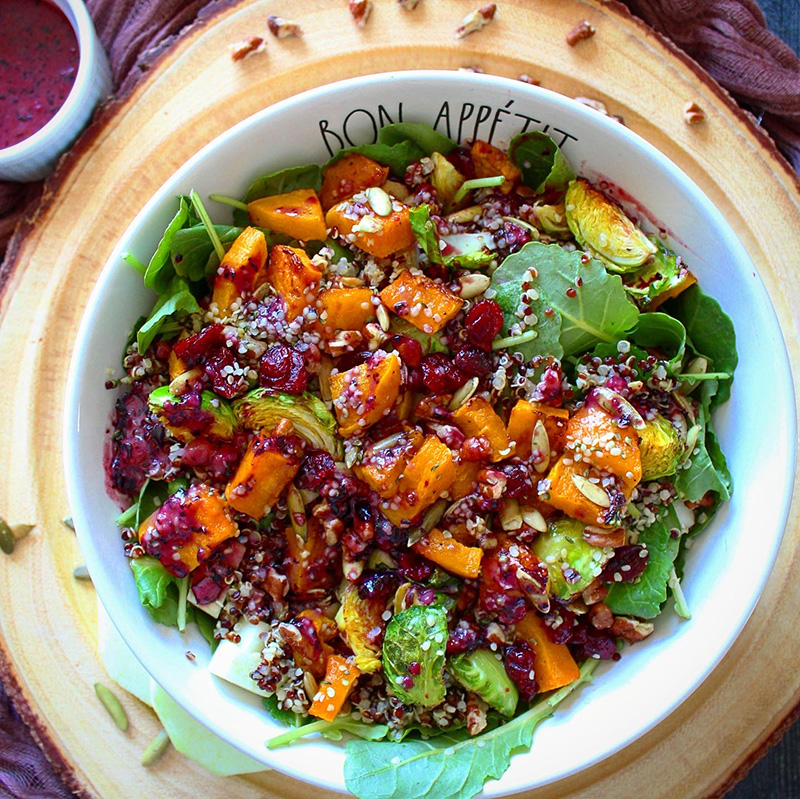 A colorful vegan salad dressing recipe using blueberries