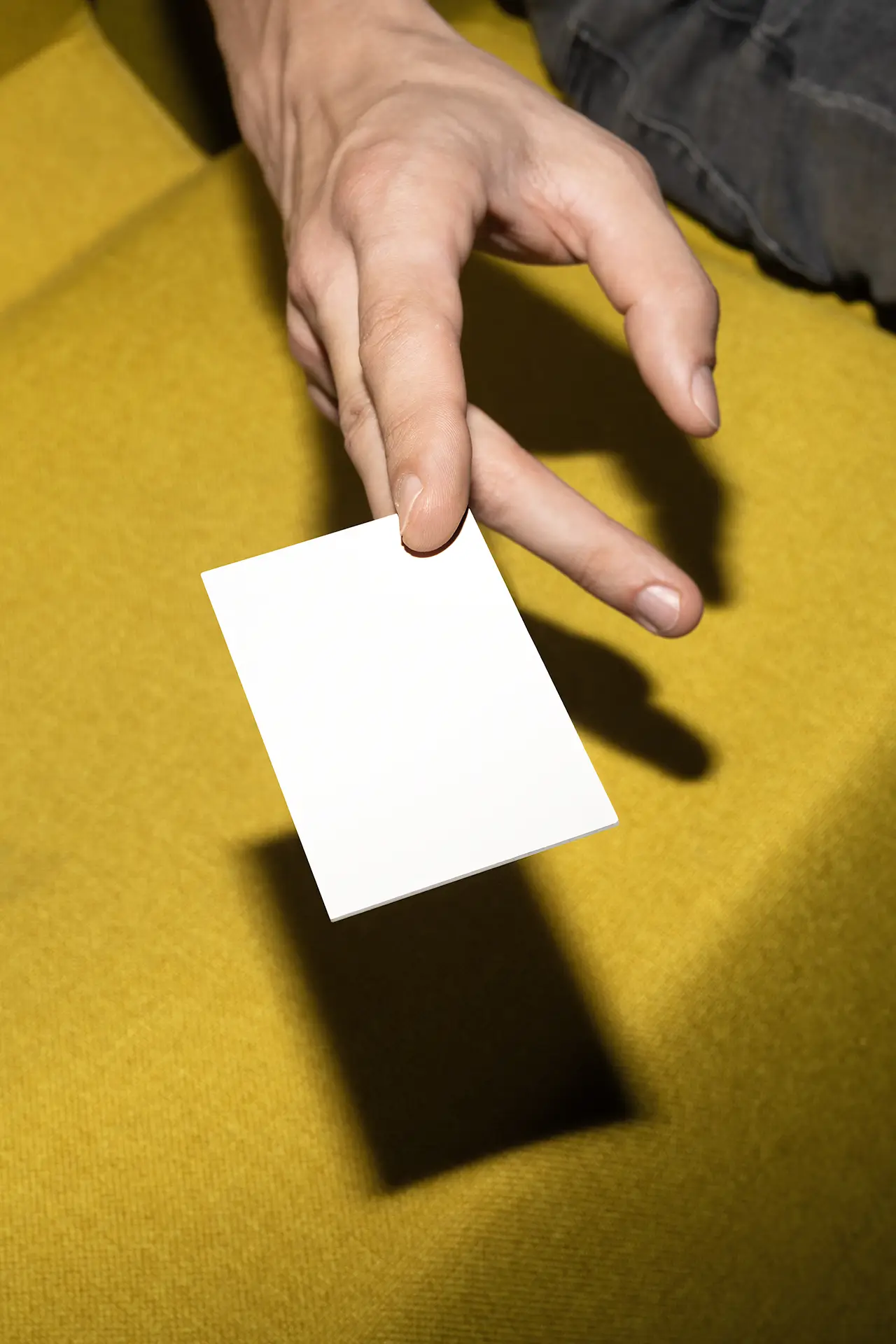 Blank large vertical banner mockup placed between building columns.