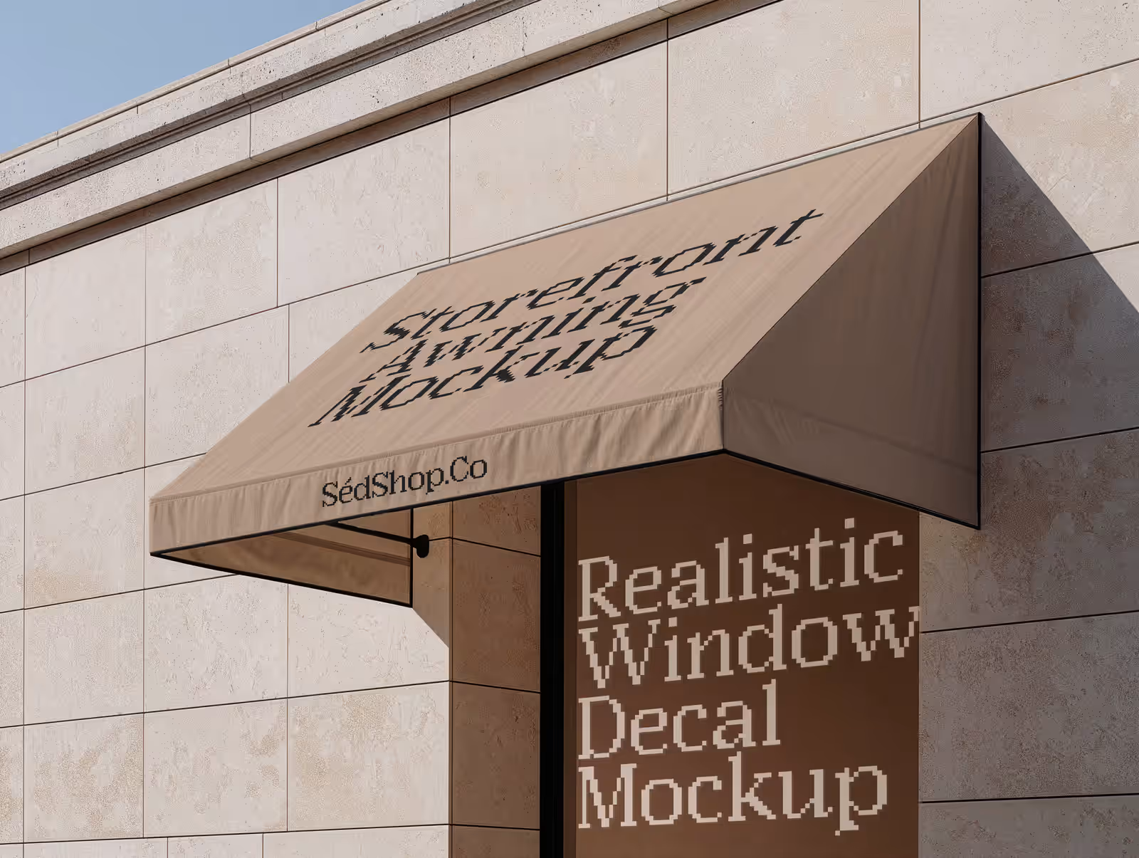 A fabric storefront awning with a warm gradient design above a stone building facade in daylight.