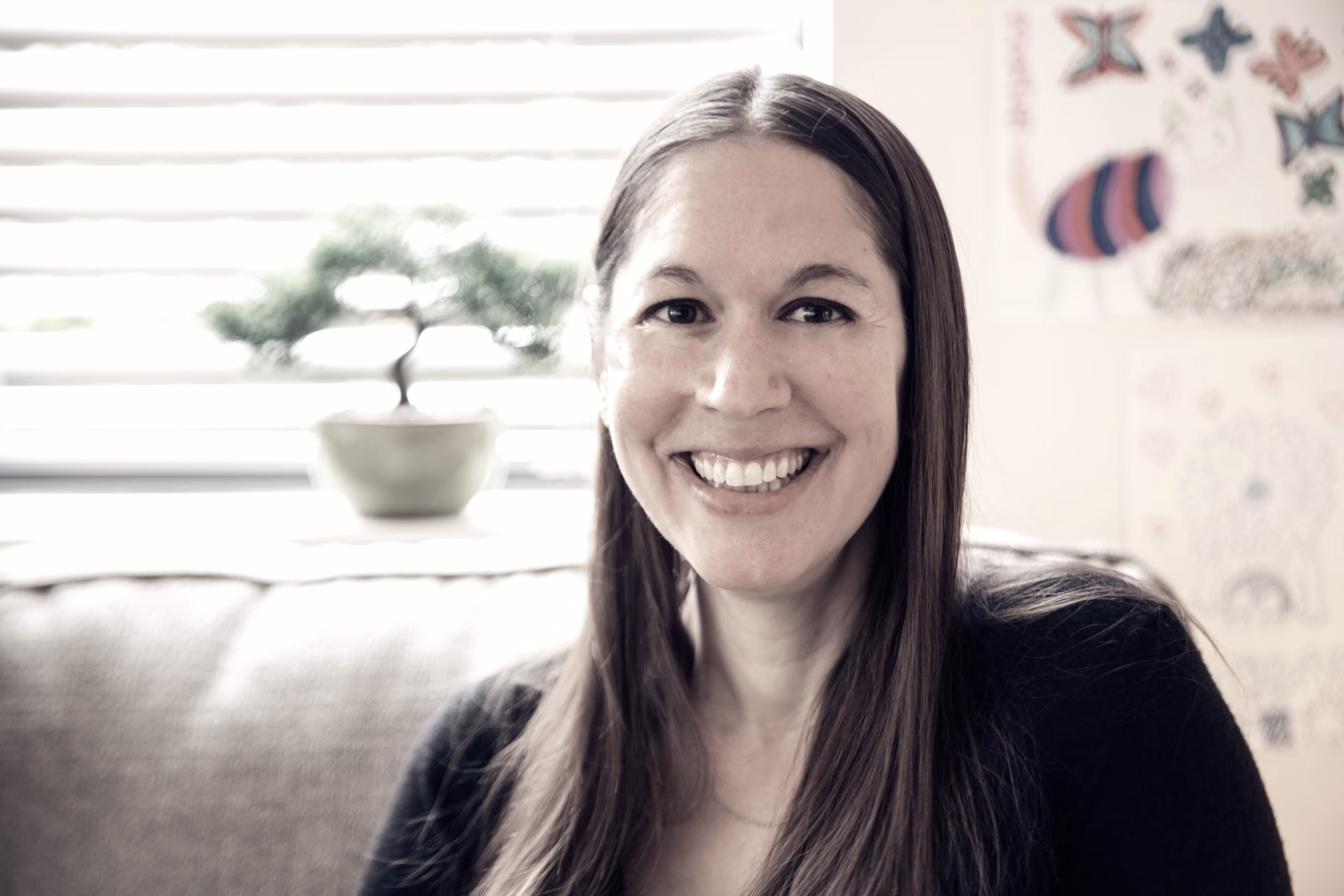 Rachel Zoffness sitting in her office