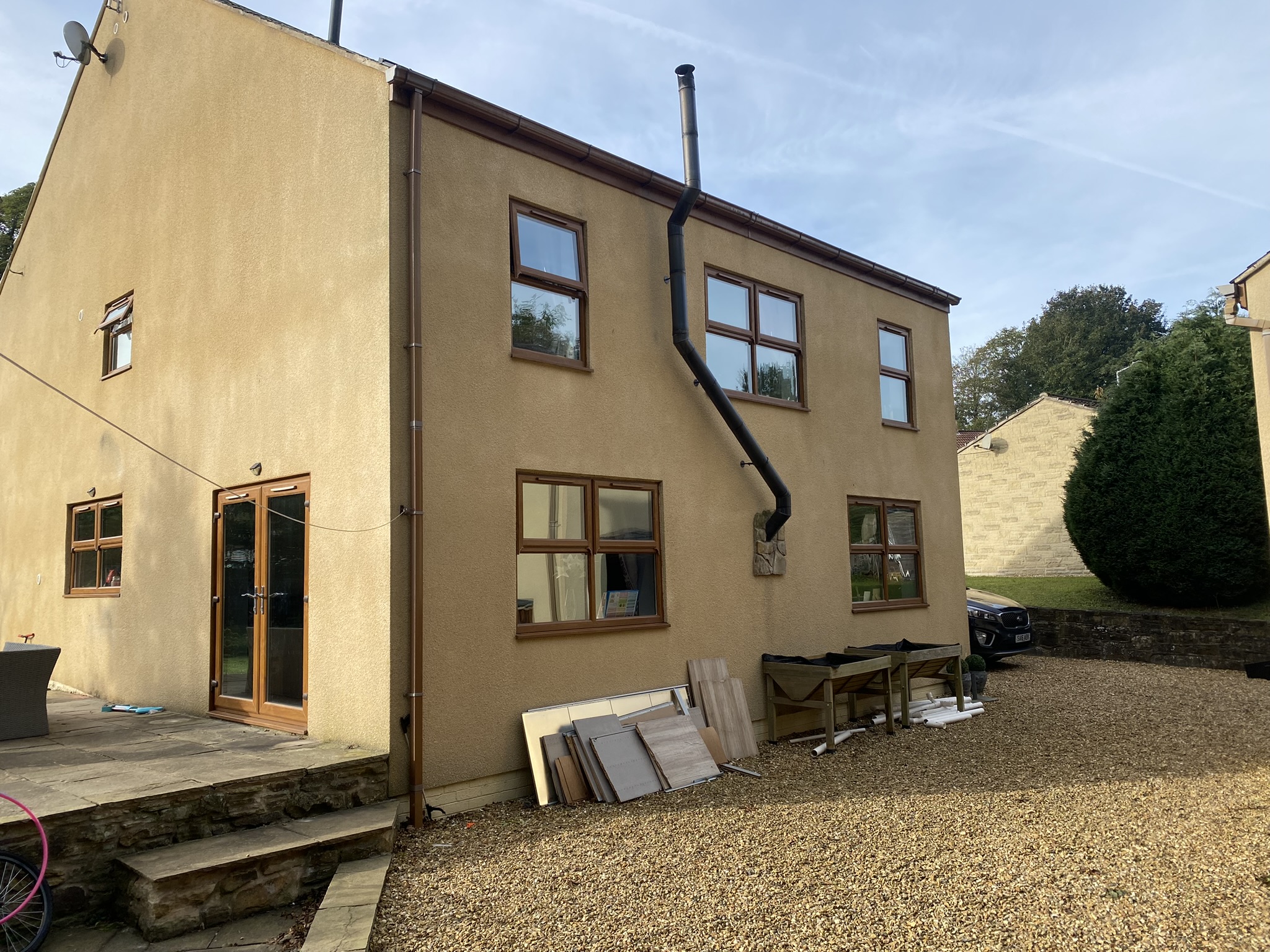 Before: existing gable with external timber staircase to first-floor store, Dronfield, Derbyshire