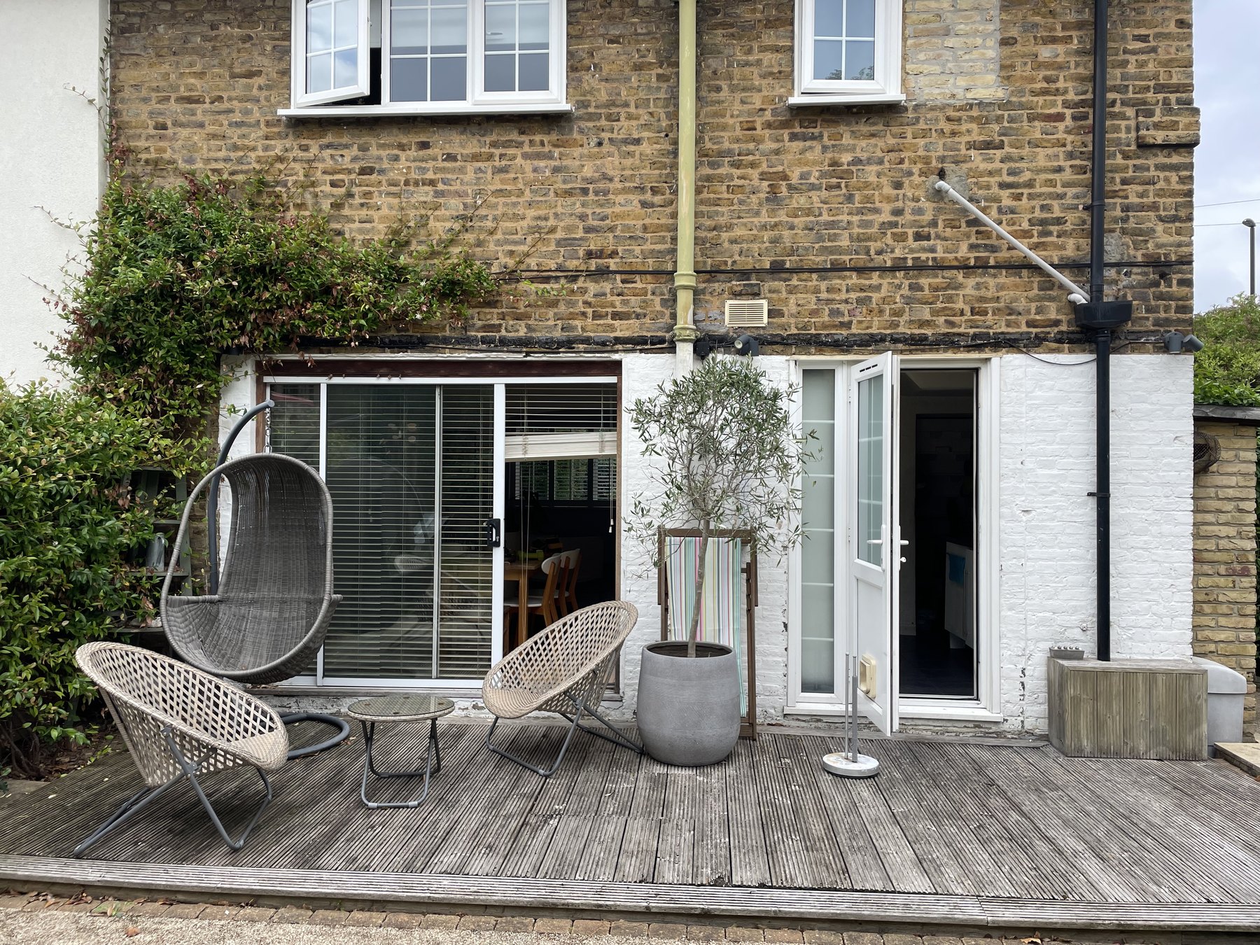 Before: the original rear elevation and decking prior to the extension, Brockley SE4
