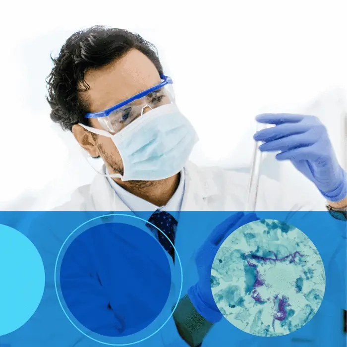 Labcorp Discovery social post: scientist in a mask examining a sample