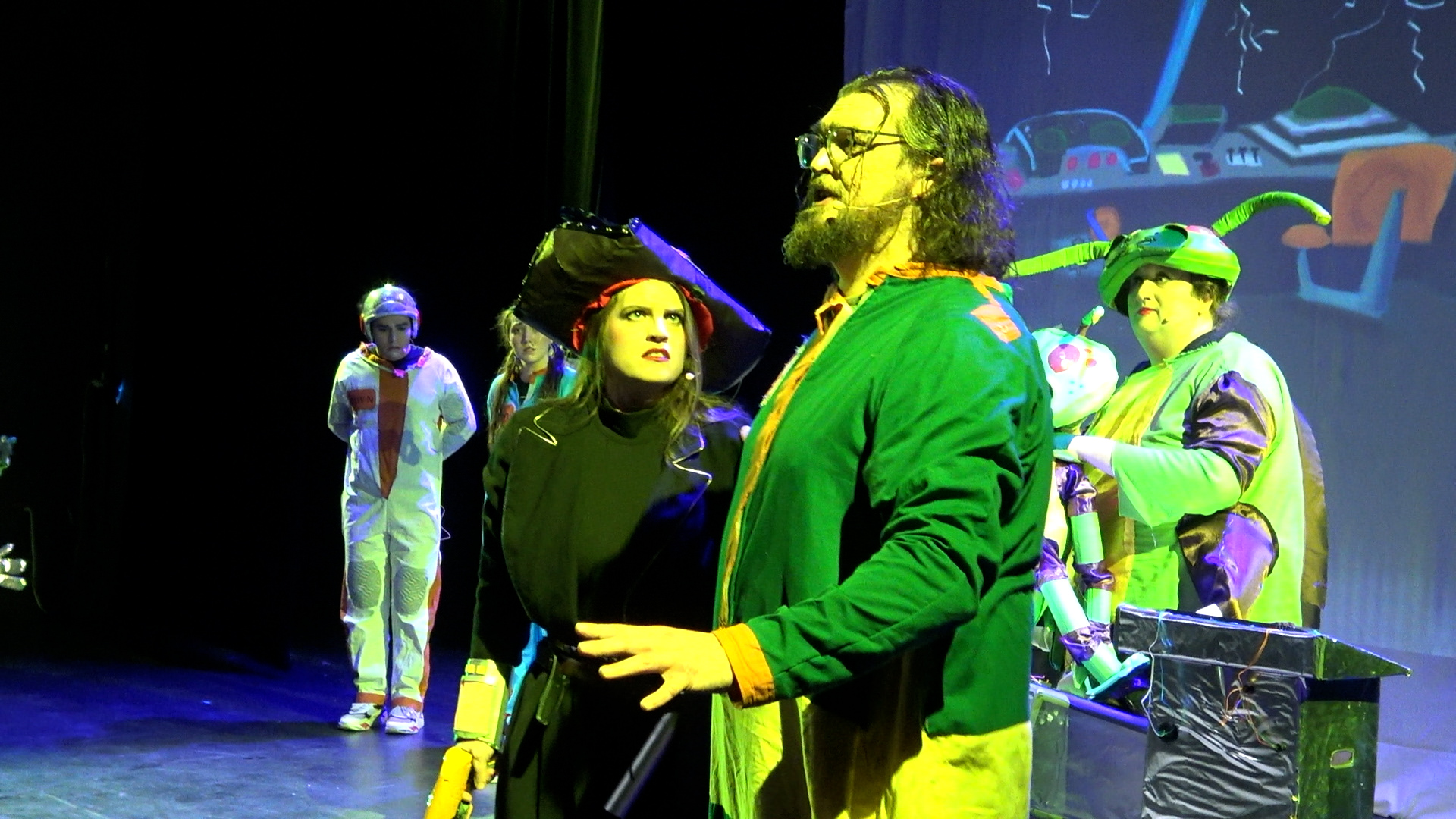 "Photo: Ken McDavitt, 2025, Undercurrents festival and Sol One Arts production. Laurenne Tynski as Sam. Euan Wheaton as Gene. Mathieu J. Roy as Bobby. Benjamin Haile as Jim. Gillian Hosick as Demona."