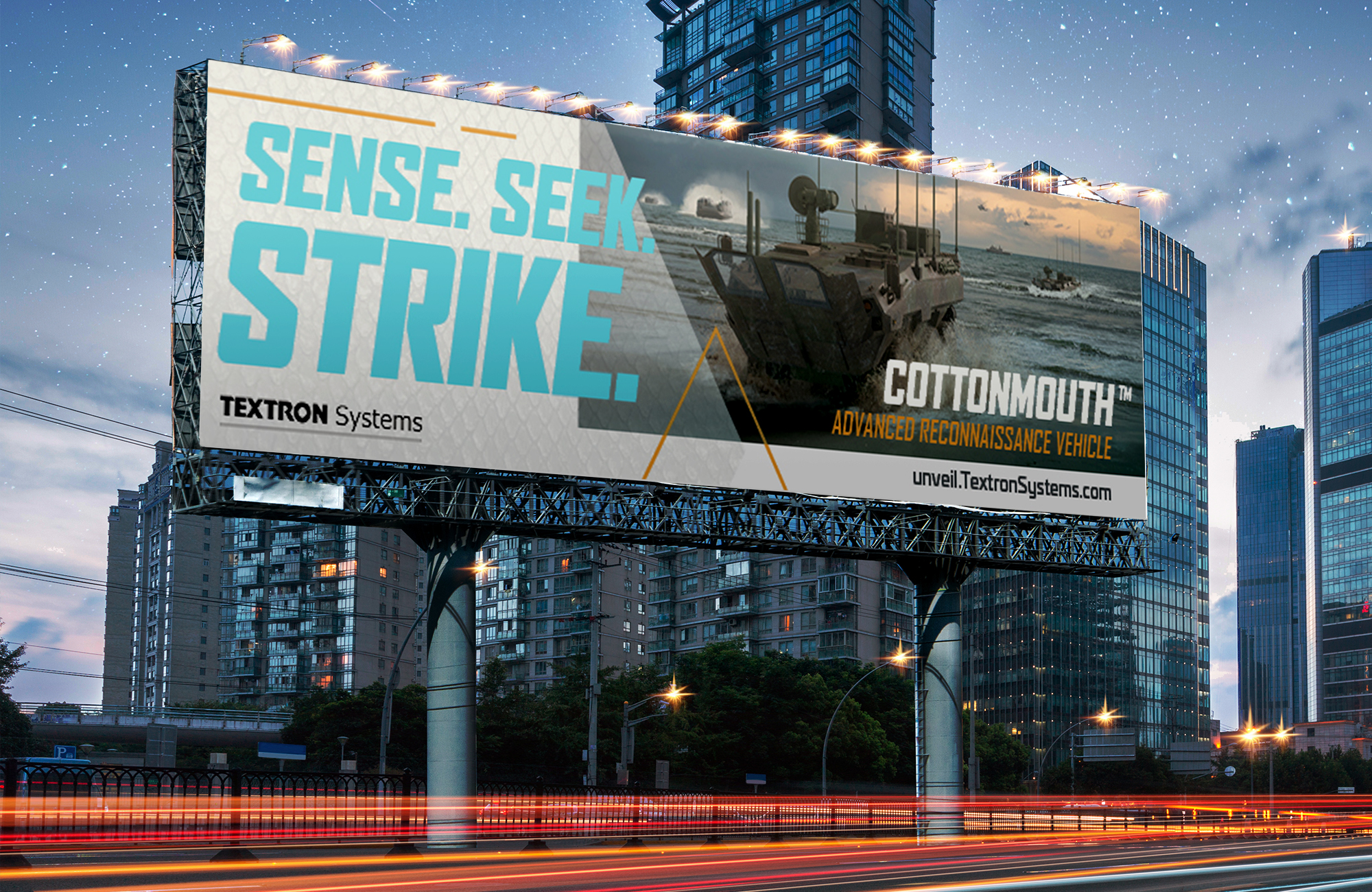 Billboard promoting a reconnaissance vehicle that says "Sense. Seek. Strike."