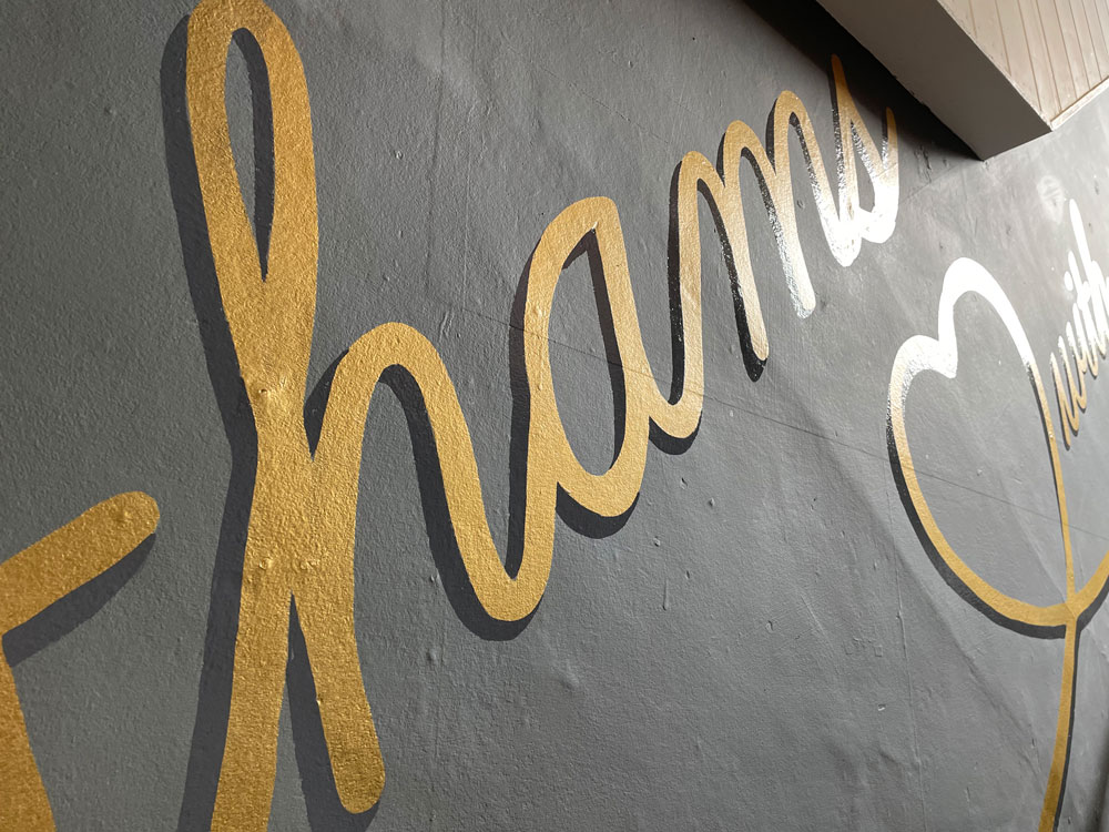 adamdoesdesign lathamshome interiors hand painted sign writing wall mural 2