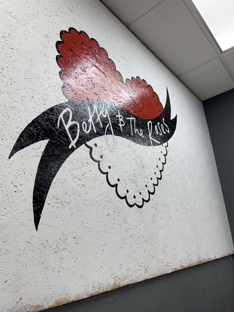 adamdoesdesign betty and the roses hand painted sign writing wall mural logo 7