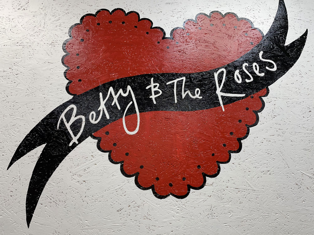 adamdoesdesign betty and the roses hand painted sign writing wall mural logo 2