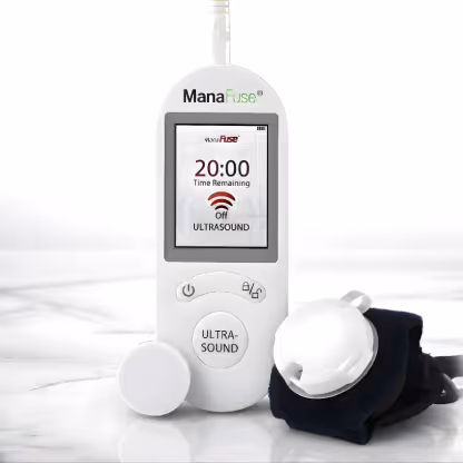 ManaFuse handheld ultrasound device with digital display, control buttons, and attached wristband on marble surface.
