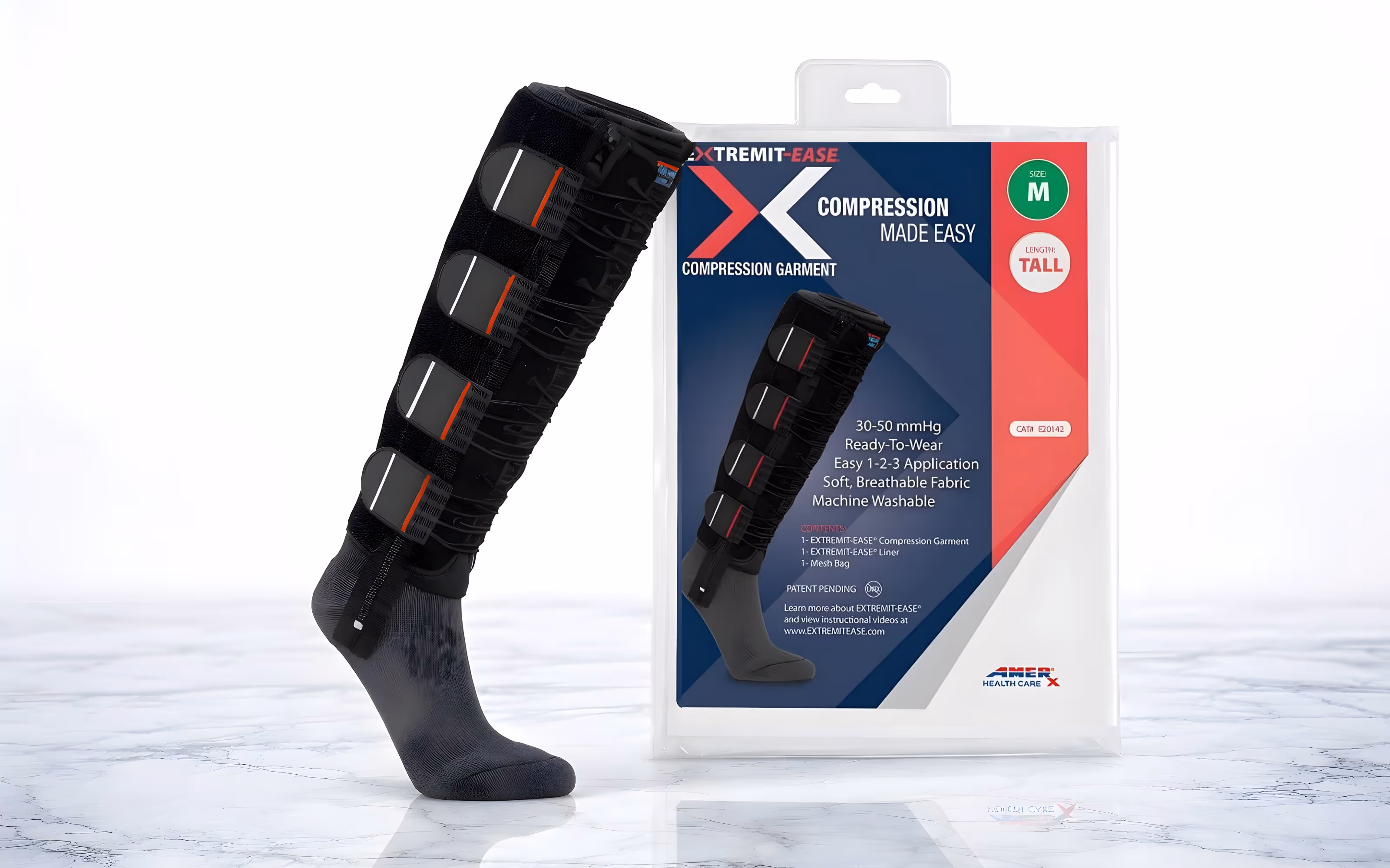 Black EXTREMIT-EASE compression garment worn on a sock displayed beside its packaging with product details on a marble surface.