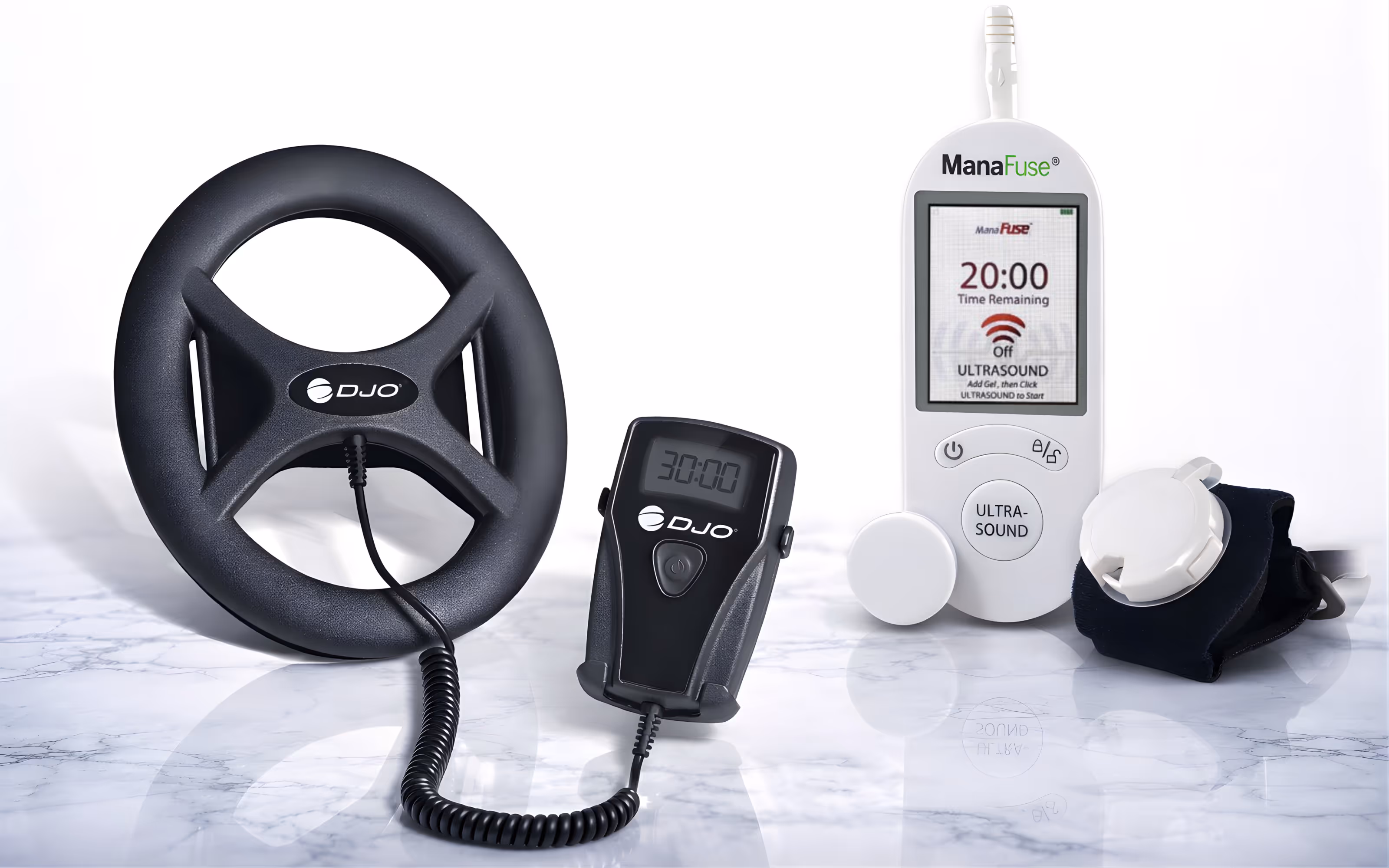 Two medical devices on a marble surface: a black circular DJO device with a connected remote showing 30:00, and a white ManaFuse ultrasound device with a digital screen displaying 20:00 and accompanying strap.