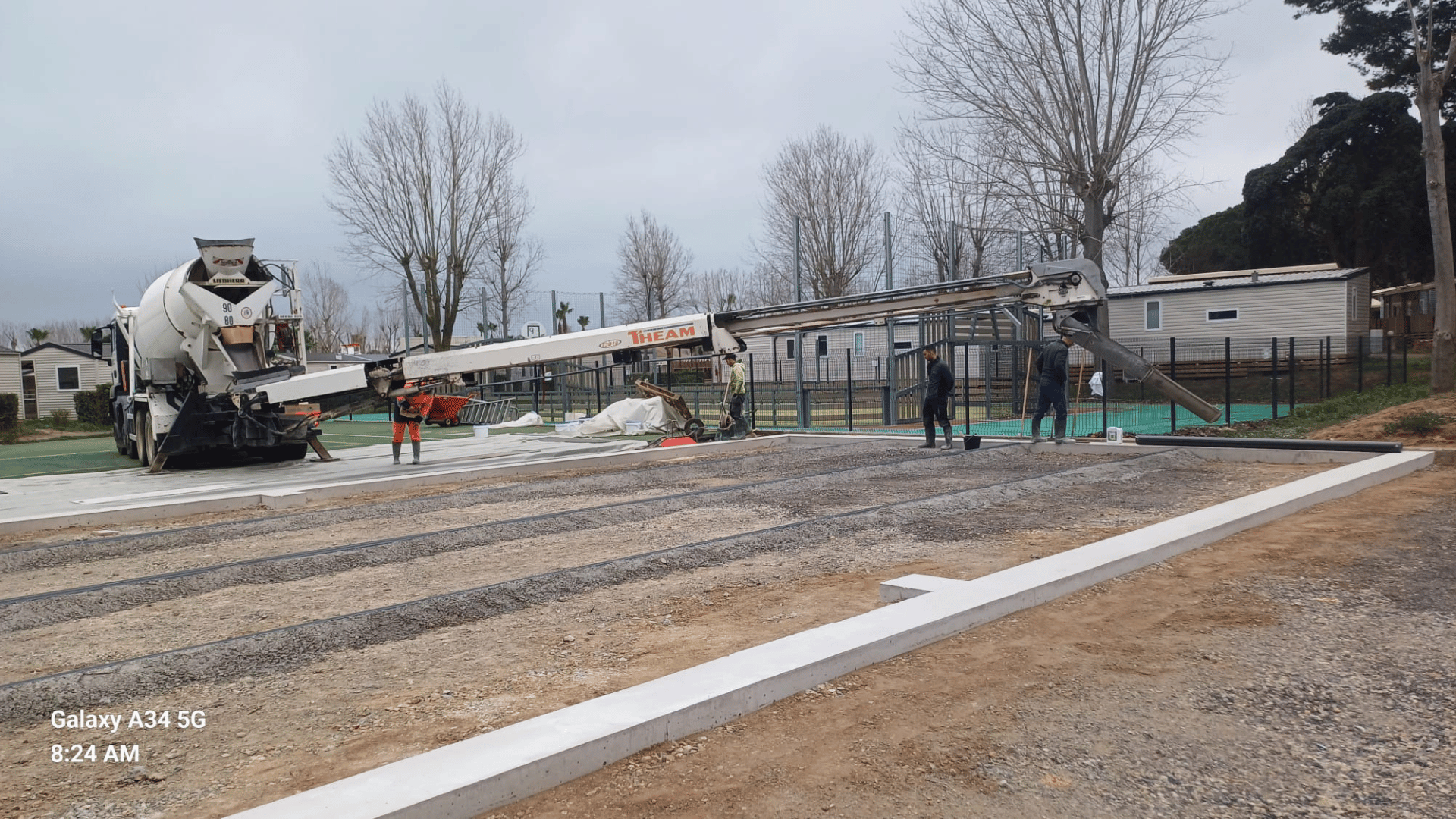 Chantier d'un sol d'aire de fitness AirFit