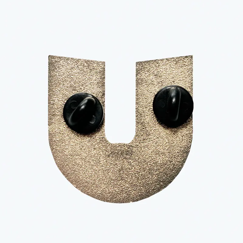 Back shot of Unify Pin "U" Logo with rubber backings