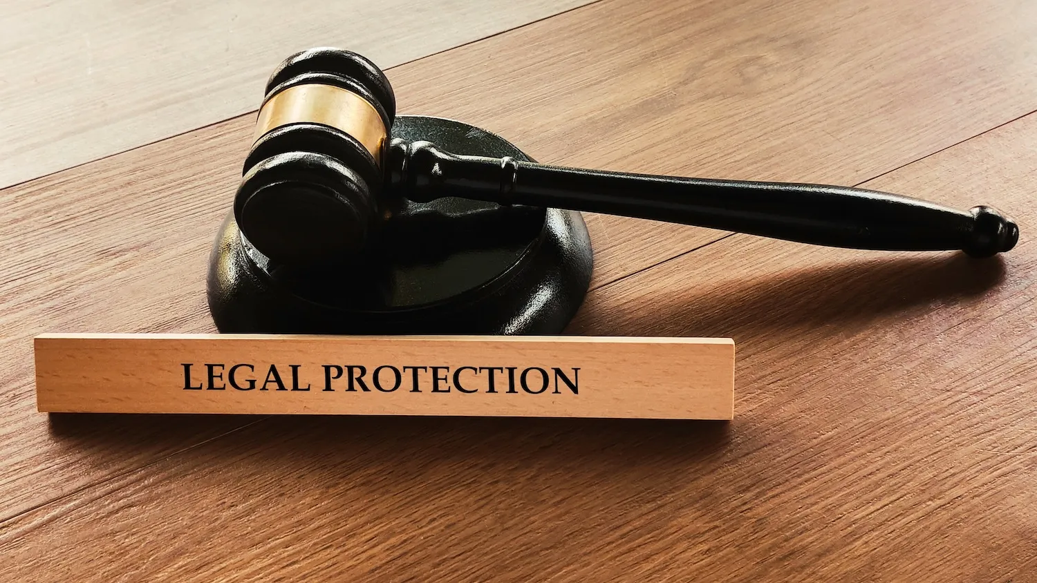 Judge's gavel with legal protection text