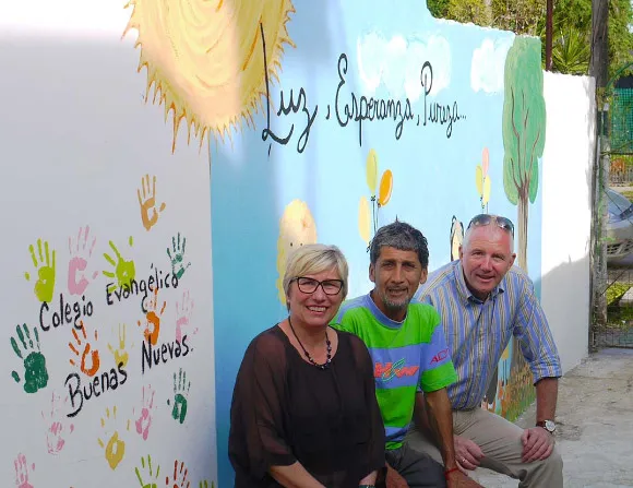 Petra Hammelmann, Humberto Demagro & Bertold Zink sit outside Luz Esperanza Pureza (LEP) in Garin, Argentina.