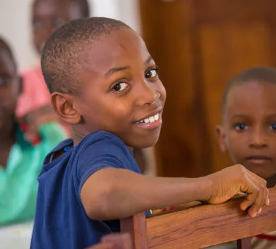 Happy smiling Tanzanian boy.