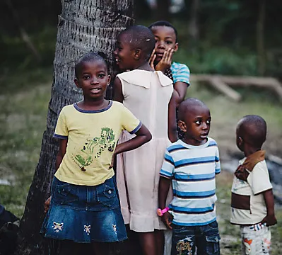 A group of TSE children awaiting a talent show.