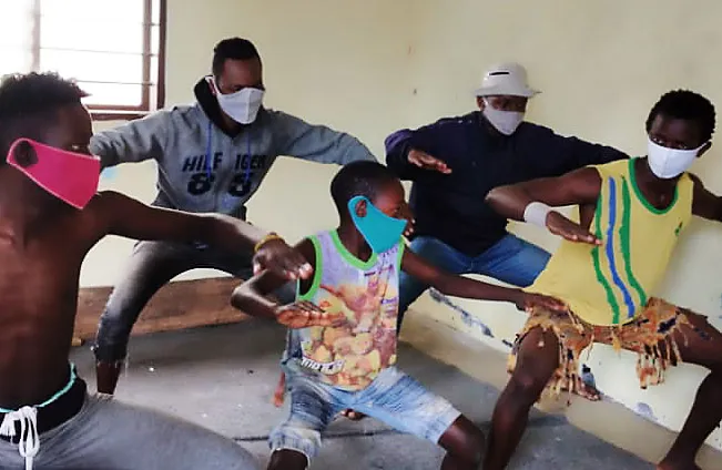 A group of dancers practicing their dance routine.