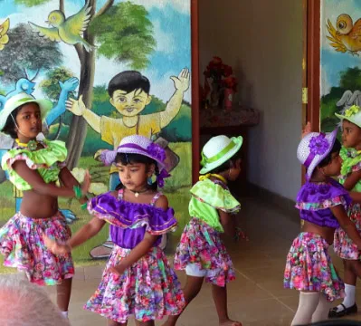 A group of girls dance for the show.
