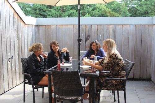 Vertex team sat outside on balcony