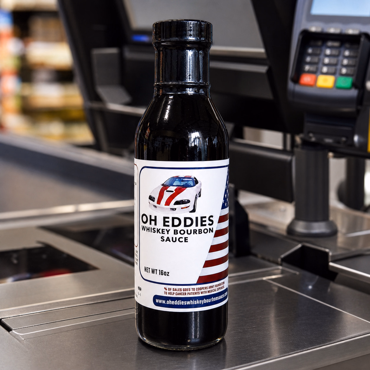 Three bottles of Oh Eddies Whiskey Bourbon Sauce with nutrition, logo, and recipe labels.