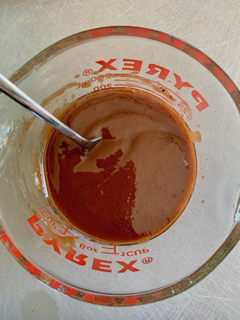 BBQ Vinaigrette in a glass measuring cup